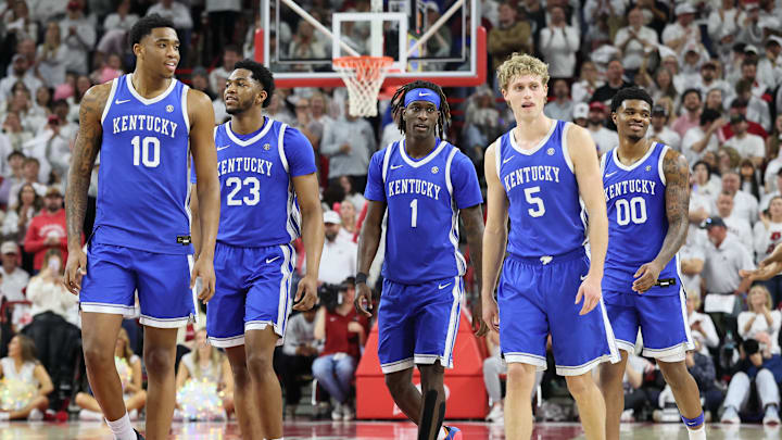 Jan 31, 2026; Fayetteville, Arkansas, USA; Kentucky Wildcats players return to the court after a timeout during the second half against the Arkansas Razorbacks at Bud Walton Arena. Kentucky won 85-77. Mandatory Credit: Nelson Chenault-Imagn Images Jan 31, 2026; Fayetteville, Arkansas, USA; Kentucky Wildcats players return to the court after a timeout during the second half against the Arkansas Razorbacks at Bud Walton Arena. Kentucky won 85-77. Mandatory Credit: Nelson Chenault-Imagn Images