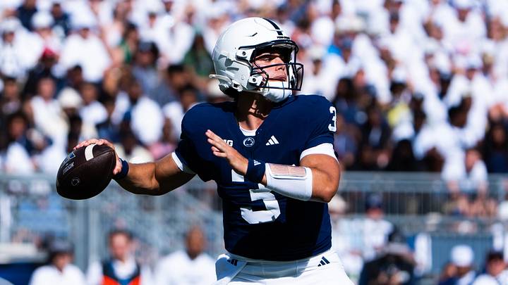 Penn State quarterback Rocco Becht looks to pass during a college football game against Marshall. Penn State quarterback Rocco Becht looks to pass during a college football game against Marshall.