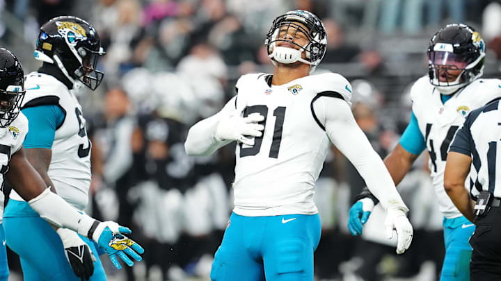 Dec 22, 2024; Paradise, Nevada, USA; Jacksonville Jaguars defensive end Arik Armstead (91) celebrates after sacking Las Vegas Raiders quarterback Aidan O'Connell (12) during the first quarter at Allegiant Stadium. Mandatory Credit: Stephen R. Sylvanie-Imagn Images