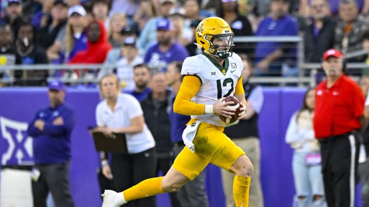 Nov 18, 2023; Fort Worth, Texas, USA; Baylor Bears quarterback Blake Shapen (12) runs with the ball against the TCU Horned Frogs during the second half at Amon G. Carter Stadium. Mandatory Credit: Jerome Miron-USA TODAY Sports Nov 18, 2023; Fort Worth, Texas, USA; Baylor Bears quarterback Blake Shapen (12) runs with the ball against the TCU Horned Frogs during the second half at Amon G. Carter Stadium. Mandatory Credit: Jerome Miron-USA TODAY Sports