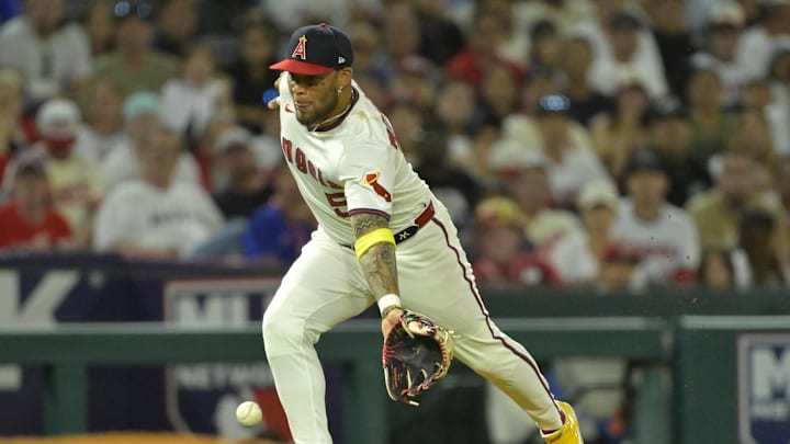 Jul 12, 2025; Anaheim, California, USA; Los Angeles Angels third baseman Yoan Moncada (5) fields an infield hit by Arizona Diamondbacks catcher James McCann (8) in the eighth inning at Angel Stadium. Mandatory Credit: Jayne Kamin-Oncea-Imagn Images Jul 12, 2025; Anaheim, California, USA; Los Angeles Angels third baseman Yoan Moncada (5) fields an infield hit by Arizona Diamondbacks catcher James McCann (8) in the eighth inning at Angel Stadium. Mandatory Credit: Jayne Kamin-Oncea-Imagn Images