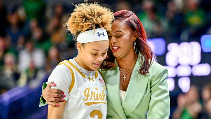 Feb 17, 2025; South Bend, Indiana, USA; Notre Dame Fighting Irish head coach Niele Ivey talks to guard Hannah Hidalgo (3) in the second half against the Duke Blue Devils at the Purcell Pavilion. Mandatory Credit: Matt Cashore-Imagn Images Feb 17, 2025; South Bend, Indiana, USA; Notre Dame Fighting Irish head coach Niele Ivey talks to guard Hannah Hidalgo (3) in the second half against the Duke Blue Devils at the Purcell Pavilion. Mandatory Credit: Matt Cashore-Imagn Images