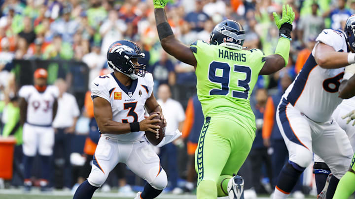Sep 12, 2022; Seattle, Washington, USA; Denver Broncos quarterback Russell Wilson (3) scrambles away