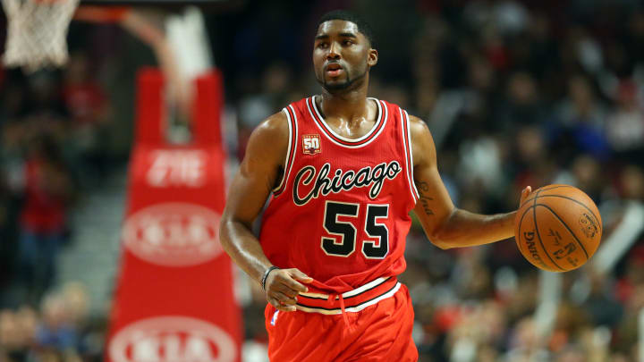 Former Chicago Bulls guard E'Twaun Moore (55) brings the ball up the court Former Chicago Bulls guard E'Twaun Moore (55) brings the ball up the court