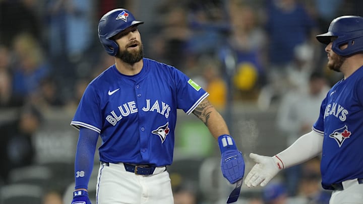 May 22, 2025; Toronto, Ontario, CAN; Toronto Blue Jays catcher Alejandro Kirk (30) congratulates right fielder Nathan Lukes (38) after scoring against the San Diego Padres during the tenth inning at Rogers Centre. Mandatory Credit: John E. Sokolowski-Imagn Images