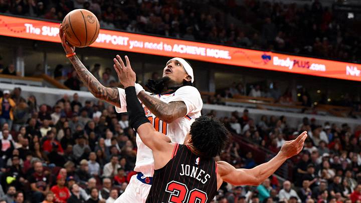 Oct 28, 2026; Chicago, Illinois, USA; New York Knicks guard Jordan Clarkson (00) shoots against Chicago Bulls guard Tre Jones (30) during the second half at United Center. Mandatory Credit: Matt Marton-Imagn Images Oct 28, 2026; Chicago, Illinois, USA; New York Knicks guard Jordan Clarkson (00) shoots against Chicago Bulls guard Tre Jones (30) during the second half at United Center. Mandatory Credit: Matt Marton-Imagn Images