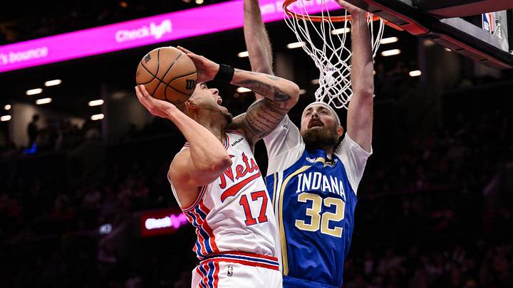 Oct 25, 2026; Brooklyn, New York, USA;  Brooklyn Nets forward Michael Porter Jr. (17) shoots the ball while defended by Indiana Pacers center Jay Huff (32) during the first half at Barclays Center.  Mandatory Credit: John Jones-Imagn Images