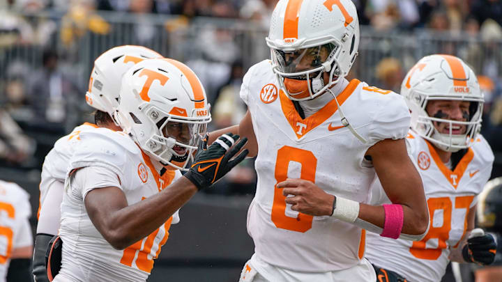 Tennessee wide receiver Mike Matthews (10) celebrates his touchdown with quarterback Nico Iamaleava (8) during the third quarter at FirstBank Stadium in Nashville, Tenn., Saturday, Nov. 30, 2024.