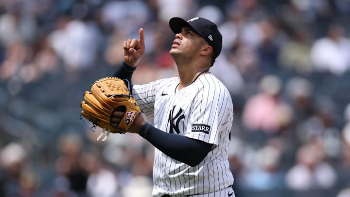 Jun 22, 2025; Bronx, New York, USA; New York Yankees relief pitcher Fernando Cruz (63) reacts after striking out the side during the eighth inning against the Baltimore Orioles at Yankee Stadium. Mandatory Credit: Vincent Carchietta-Imagn Images