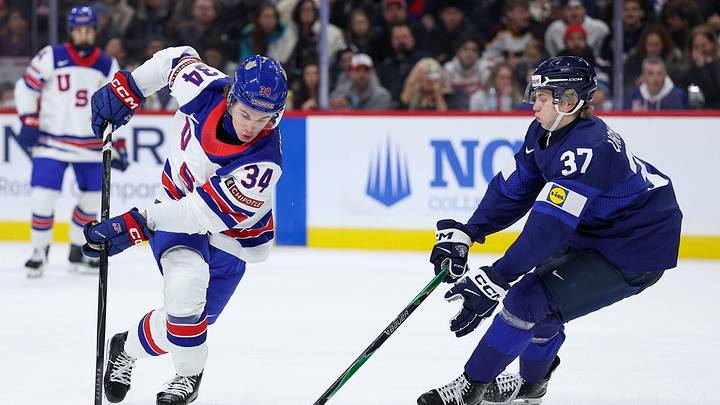 Jan 2, 2026; St. Paul, Minnesota, UNITED STATES; United States forward Cole Eiserman (34) and Finland forward Matias Vanhanen (37) compete for the puck during the first period in the quarterfinals of the 2026 IIHF World Junior Championship at Grand Casino Arena. Mandatory Credit: Matt Krohn-Imagn Images Jan 2, 2026; St. Paul, Minnesota, UNITED STATES; United States forward Cole Eiserman (34) and Finland forward Matias Vanhanen (37) compete for the puck during the first period in the quarterfinals of the 2026 IIHF World Junior Championship at Grand Casino Arena. Mandatory Credit: Matt Krohn-Imagn Images