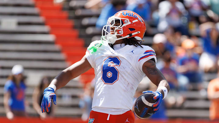Apr 12, 2025; Gainesville, FL, USA; Florida Gators wide receiver Dallas Wilson (6) reacts after scoring a touchdown during the second half at Ben Hill Griffin Stadium. Mandatory Credit: Matt Pendleton-Imagn Images