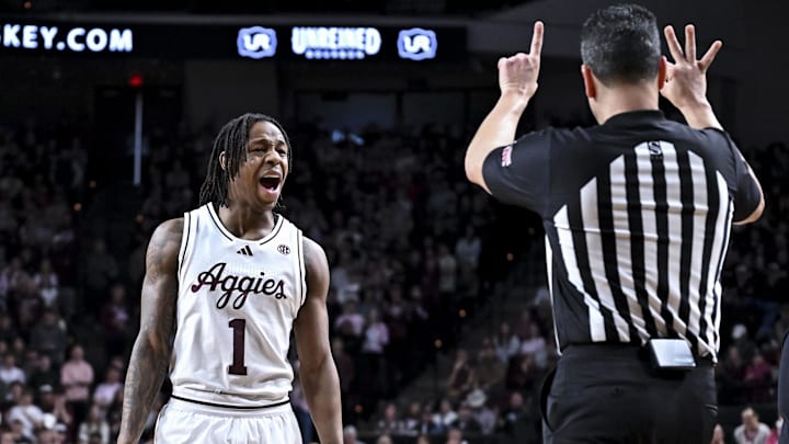 Jan 24, 2026; College Station, Texas, USA; Texas A&M Aggies guard Josh Holloway (1) reacts during the first half against the South Carolina Gamecocks at Reed Arena. Mandatory Credit: Maria Lysaker-Imagn Images 