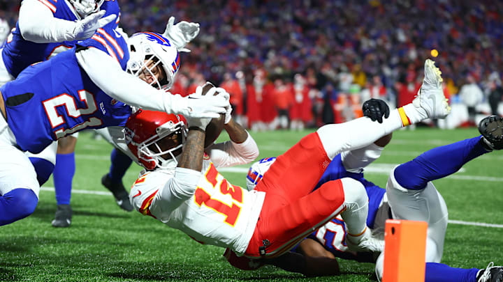Jan 21, 2024; Orchard Park, New York, USA; Buffalo Bills safety Jordan Poyer (21) causes a fumble on Kansas City Chiefs wide receiver Mecole Hardman Jr. (12) through the end zone for a touchback during the second half for the 2024 AFC divisional round 