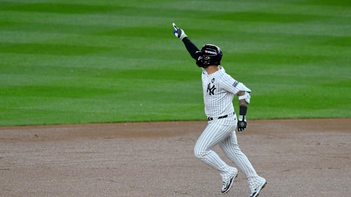 Oct 29, 2024; New York, New York, USA; New York Yankees second baseman Gleyber Torres (25) celebrates after hitting a three-run home run during the eighth inning against the Los Angeles Dodgers in game four of the 2024 MLB World Series at Yankee Stadium. 