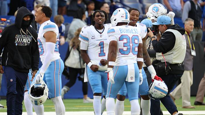 Oct 18, 2026; Indianapolis, Indiana, USA;  Tennessee Titans quarterback Cam Ward (1) reacts with teammates after defeating the Indianapolis Colts at Lucas Oil Stadium.  Mandatory Credit: Trevor Ruszkowski-Imagn Images