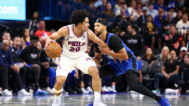 Nov 15, 2024; Orlando, Florida, USA; Philadelphia 76ers guard Jared McCain (20) controls the ball from Orlando Magic guard Jalen Suggs (4) in the fourth quarter at Kia Center. Mandatory Credit: Nathan Ray Seebeck-Imagn Images Nov 15, 2024; Orlando, Florida, USA; Philadelphia 76ers guard Jared McCain (20) controls the ball from Orlando Magic guard Jalen Suggs (4) in the fourth quarter at Kia Center. Mandatory Credit: Nathan Ray Seebeck-Imagn Images