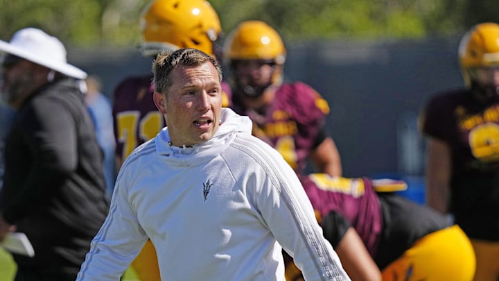 ASU head coach Kenny Dillingham coaches his squad during spring practice at Kajikawa practice fields in Tempe on April 4, 2023.

Football Asu Fb