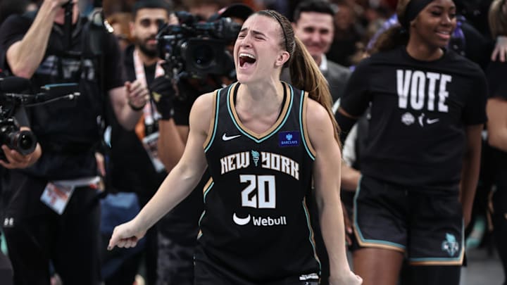 Oct 20, 2024; Brooklyn, New York, USA; New York Liberty guard Sabrina Ionescu (20) celebrates after defeating the Minnesota Lynx in game five of the 2024 WNBA Finals at Barclays Center. Mandatory Credit: Wendell Cruz-Imagn Images