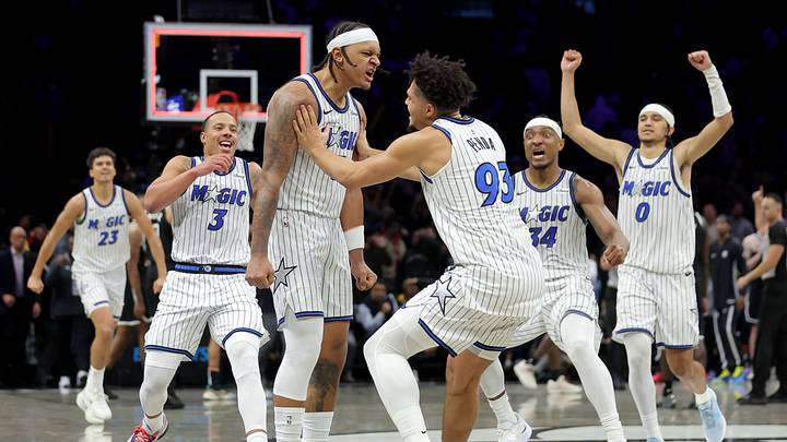 Jan 7, 2026; Brooklyn, New York, USA; Orlando Magic forward Paolo Banchero (5) celebrates his overtime game-winning three point shot against the Brooklyn Nets with guard Desmond Bane (3) and forward Noah Penda (93) and center Wendell Carter Jr. (34) and guard Anthony Black (0) at Barclays Center. Mandatory Credit: Brad Penner-Imagn Images Jan 7, 2026; Brooklyn, New York, USA; Orlando Magic forward Paolo Banchero (5) celebrates his overtime game-winning three point shot against the Brooklyn Nets with guard Desmond Bane (3) and forward Noah Penda (93) and center Wendell Carter Jr. (34) and guard Anthony Black (0) at Barclays Center. Mandatory Credit: Brad Penner-Imagn Images