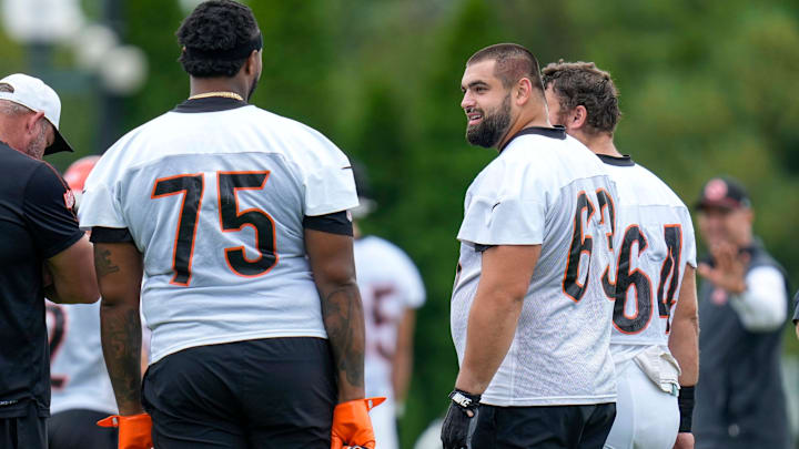 Cincinnati Bengals guard Dylan Fairchild (63) talks with offensive tackle Orlando Brown Jr. (75) during practice at the Paycor Stadium practice field in downtown Cincinnati on Wednesday, Aug. 20, 2025.