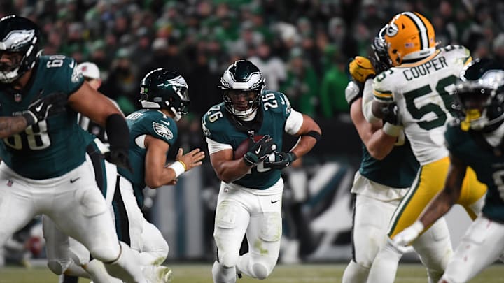 Jan 12, 2025; Philadelphia, Pennsylvania, USA; Philadelphia Eagles running back Saquon Barkley (26) rushes the ball against the Green Bay Packers during the second half in an NFC wild card game at Lincoln Financial Field. Mandatory Credit: Eric Hartline-Imagn Images Jan 12, 2025; Philadelphia, Pennsylvania, USA; Philadelphia Eagles running back Saquon Barkley (26) rushes the ball against the Green Bay Packers during the second half in an NFC wild card game at Lincoln Financial Field. Mandatory Credit: Eric Hartline-Imagn Images