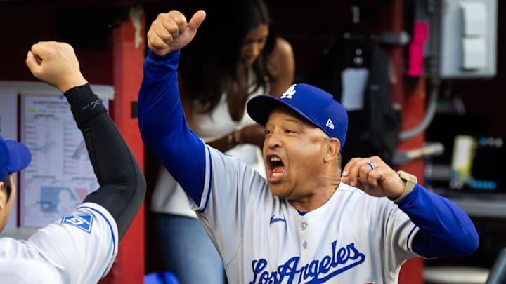 May 9, 2025; Phoenix, Arizona, USA; Los Angeles Dodgers manager Dave Roberts reacts in the dugout against the Arizona Diamondbacks at Chase Field. Mandatory Credit: Mark J. Rebilas-Imagn Images May 9, 2025; Phoenix, Arizona, USA; Los Angeles Dodgers manager Dave Roberts reacts in the dugout against the Arizona Diamondbacks at Chase Field. Mandatory Credit: Mark J. Rebilas-Imagn Images