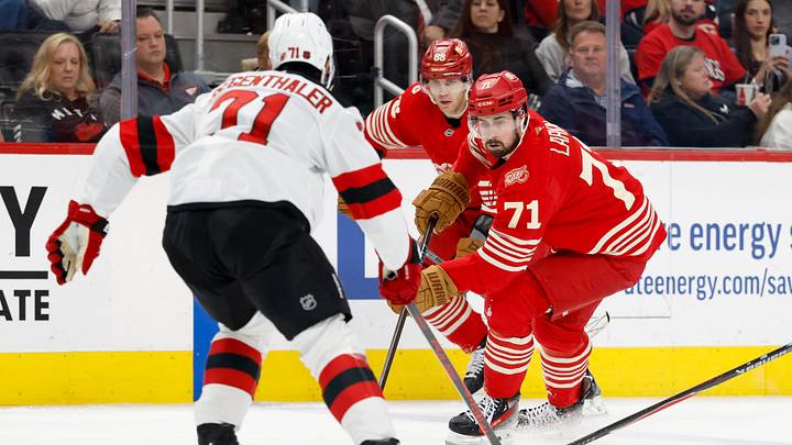 Apr 11, 2026; Detroit, Michigan, USA;  Detroit Red Wings center Dylan Larkin (71) skates with the puck in the second period against the New Jersey Devils at Little Caesars Arena. Mandatory Credit: Rick Osentoski-Imagn Images