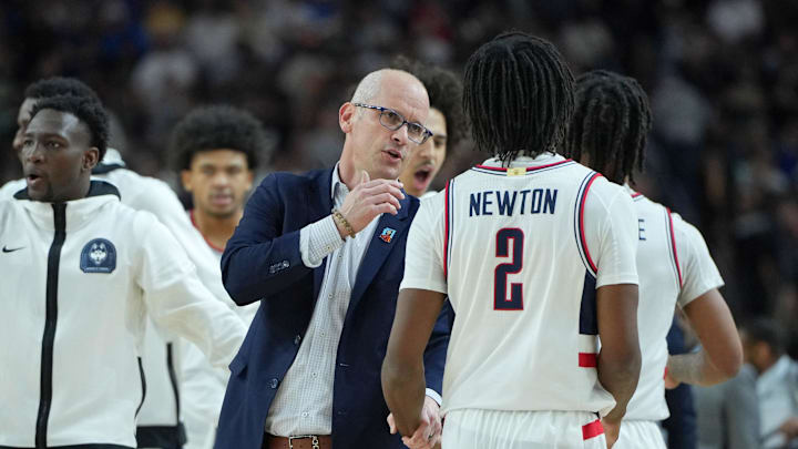 Apr 8, 2024; Glendale, AZ, USA; Connecticut Huskies head coach Dan Hurley talks with guard Tristen Newton (2) during a timeout during the first half of the national championship game of the Final Four of the 2024 NCAA Tournament at State Farm Stadium. Mandatory Credit: Bob Donnan-USA TODAY Sports