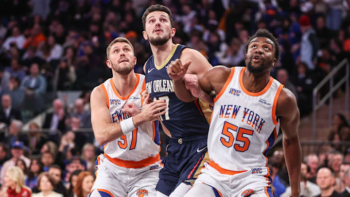 Dec 1, 2024; New York, New York, USA;  New York Knicks forward Matt Ryan (37), New Orleans Pelicans center Karlo Matkovic (17), and New York Knicks center Ariel Hukporti (55) at Madison Square Garden. Mandatory Credit: Wendell Cruz-Imagn Images