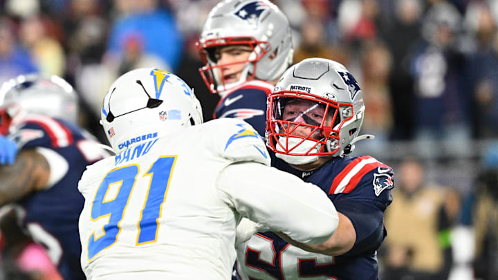 Jan 11, 2026; Foxborough, MA, USA; New England Patriots offensive tackle Will Campbell (66) blocks Los Angeles Chargers defensive tackle Da'shawn Hand (91) during the second half in an AFC Wild Card Round game at Gillette Stadium. Mandatory Credit: Eric Canha-Imagn Images