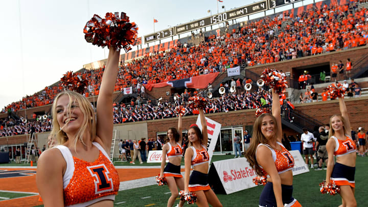 Oct 12, 2024; Champaign, Illinois, USA;  The Illinois Fighting Illini dance team performs in the second half against the Purdue Boilermakers at Memorial Stadium. Mandatory Credit: Ron Johnson-Imagn Images
