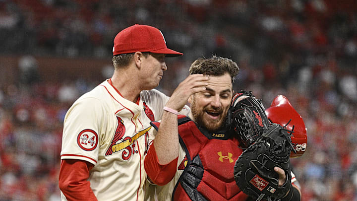 Sep 7, 2024; St. Louis, Missouri, USA; St. Louis Cardinals starting pitcher Kyle Gibson (44) and catcher Pedro Pages (43) celebrate after Gibson records his 1,500th career strike out against the Seattle Mariners in the fifth inning at Busch Stadium. Mandatory Credit: Joe Puetz-Imagn Images