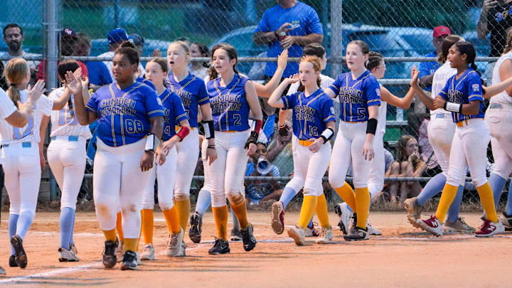 Camden-Wyoming pitcher Shaianne Benson leads her team in the postgame handshake line after Camden-Wyoming's 18-0 win against Newark American-Canal to secure the Delaware State Little League Major League Softball championship at Milford Little League, July 12, 2025. Camden-Wyoming pitcher Shaianne Benson leads her team in the postgame handshake line after Camden-Wyoming's 18-0 win against Newark American-Canal to secure the Delaware State Little League Major League Softball championship at Milford Little League, July 12, 2025.