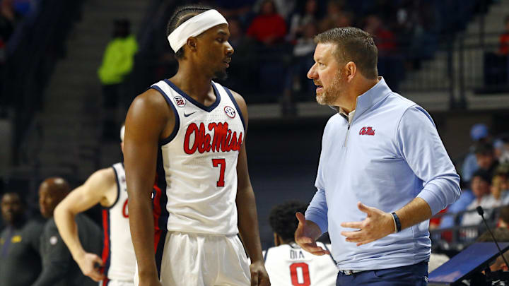 Jan 11, 2025; Oxford, Mississippi, USA; Mississippi Rebels head coach Chris Beard (right) talks with guard Davon Barnes (7) during the second half against the LSU Tigers at The Sandy and John Black Pavilion at Ole Miss. Mandatory Credit: Petre Thomas-Imagn Images Jan 11, 2025; Oxford, Mississippi, USA; Mississippi Rebels head coach Chris Beard (right) talks with guard Davon Barnes (7) during the second half against the LSU Tigers at The Sandy and John Black Pavilion at Ole Miss. Mandatory Credit: Petre Thomas-Imagn Images