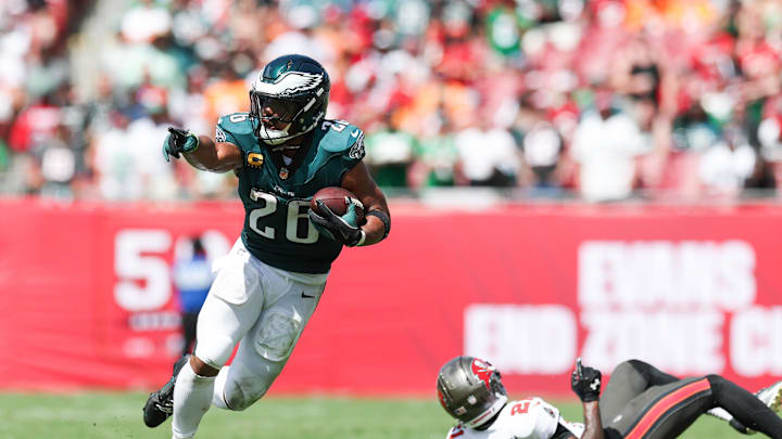 Sep 28, 2025; Tampa, Florida, USA; Philadelphia Eagles running back Saquon Barkley (26) runs with the ball during the second quarter against the Tampa Bay Buccaneers at Raymond James Stadium. Mandatory Credit: Nathan Ray Seebeck-Imagn Images Sep 28, 2025; Tampa, Florida, USA; Philadelphia Eagles running back Saquon Barkley (26) runs with the ball during the second quarter against the Tampa Bay Buccaneers at Raymond James Stadium. Mandatory Credit: Nathan Ray Seebeck-Imagn Images