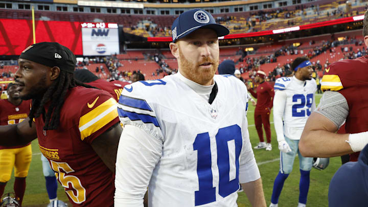 Nov 24, 2024; Landover, Maryland, USA; Dallas Cowboys quarterback Cooper Rush (10) walks off the field after shaking hands with Washington Commanders players after their game at Northwest Stadium.  