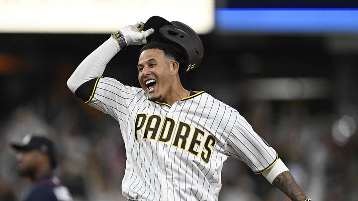 Jun 23, 2026; San Diego, California, USA; San Diego Padres third baseman Manny Machado (13) celebrates after hitting a walk-off single during the tenth inning against the Atlanta Braves at Petco Park. Mandatory Credit: Denis Poroy-Imagn Images