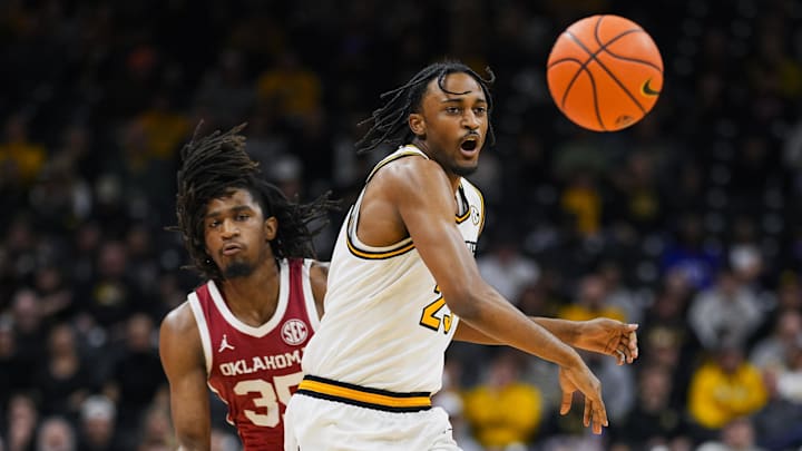 Feb 12, 2025; Columbia, Missouri, USA; Oklahoma Sooners forward Glenn Taylor Jr. (35) knocks the ball away from Missouri Tigers guard Aidan Shaw (23) during the first half at Mizzou Arena. Mandatory Credit: Jay Biggerstaff-Imagn Images Feb 12, 2025; Columbia, Missouri, USA; Oklahoma Sooners forward Glenn Taylor Jr. (35) knocks the ball away from Missouri Tigers guard Aidan Shaw (23) during the first half at Mizzou Arena. Mandatory Credit: Jay Biggerstaff-Imagn Images