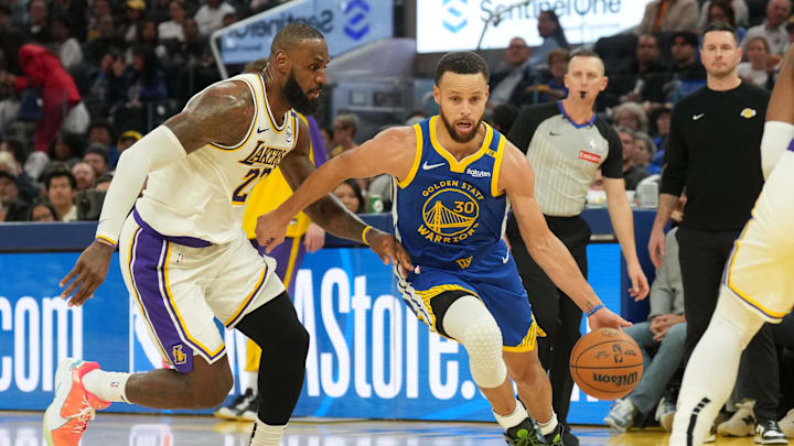 Golden State Warriors guard Stephen Curry and Los Angeles Lakers forward LeBron James on Dec 25, 2024.