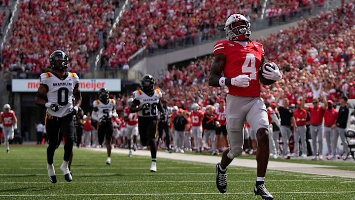 Ohio State Buckeyes wide receiver Jeremiah Smith (4) scores on an 87-yard touchdown catch during the first half of the NCAA football game against Grambling State at Ohio Stadium on Sept. 6, 2025.