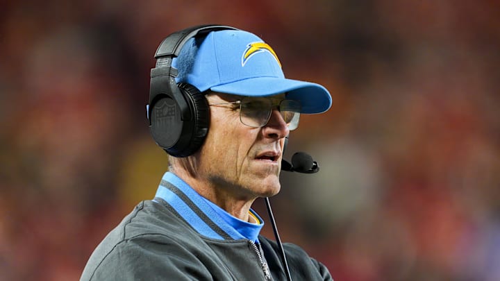 Dec 8, 2024; Kansas City, Missouri, USA; Los Angeles Chargers head coach Jim Harbaugh watches from the sideline during the first half against the Kansas City Chiefs at GEHA Field at Arrowhead Stadium. Mandatory Credit: Jay Biggerstaff-Imagn Images