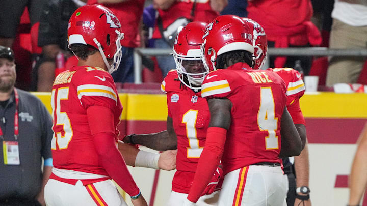 Sep 5, 2024; Kansas City, Missouri, USA; Kansas City Chiefs wide receiver Xavier Worthy (1) celebrates with quarterback Patrick Mahomes (15) and wide receiver Rashee Rice (4) after scoring a touchdown against the Baltimore Ravens during the game at GEHA Field at Arrowhead Stadium. Mandatory Credit: Denny Medley-Imagn Images