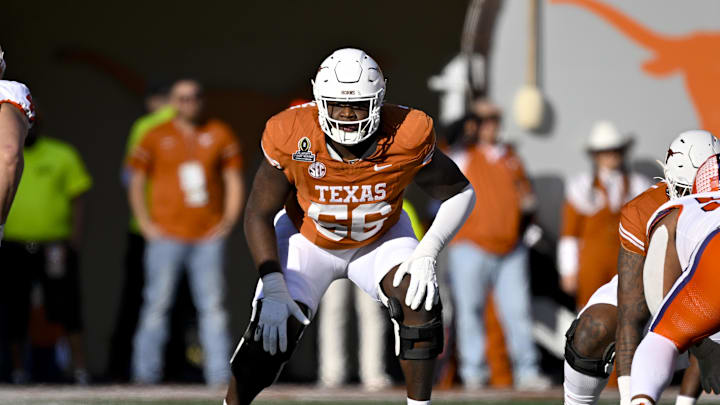 Dec 21, 2024; Austin, Texas, USA; Texas Longhorns offensive lineman Cameron Williams (56) in action during the game between the Texas Longhorns and the Clemson Tigers in the CFP National Playoff First Round at Darrell K Royal-Texas Memorial Stadium. Mandatory Credit: Jerome Miron-Imagn Images Dec 21, 2024; Austin, Texas, USA; Texas Longhorns offensive lineman Cameron Williams (56) in action during the game between the Texas Longhorns and the Clemson Tigers in the CFP National Playoff First Round at Darrell K Royal-Texas Memorial Stadium. Mandatory Credit: Jerome Miron-Imagn Images
