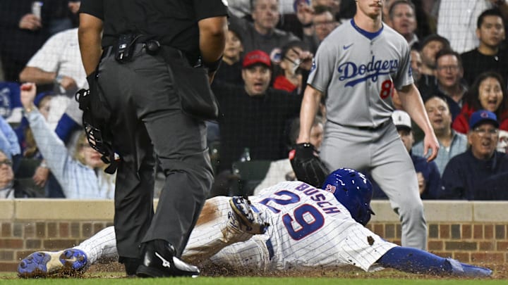 Apr 23, 2025; Chicago, Illinois, USA; Chicago Cubs first baseman Michael Busch (29) scores against the Los Angeles Dodgers during the fifth inning at Wrigley Field. Mandatory Credit: Matt Marton-Imagn Images Apr 23, 2025; Chicago, Illinois, USA; Chicago Cubs first baseman Michael Busch (29) scores against the Los Angeles Dodgers during the fifth inning at Wrigley Field. Mandatory Credit: Matt Marton-Imagn Images
