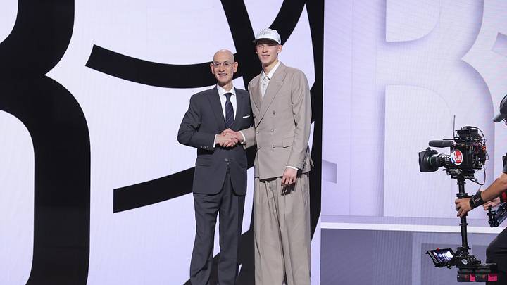 Jun 25, 2025; Brooklyn, NY, USA; Egor Demin stands with NBA commissioner Adam Silver after being selected as the eighth pick by the Brooklyn Nets in the first round of the 2025 NBA Draft at Barclays Center. Mandatory Credit: Brad Penner-Imagn Images Jun 25, 2025; Brooklyn, NY, USA; Egor Demin stands with NBA commissioner Adam Silver after being selected as the eighth pick by the Brooklyn Nets in the first round of the 2025 NBA Draft at Barclays Center. Mandatory Credit: Brad Penner-Imagn Images