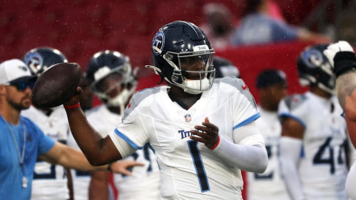 Tennessee Titans quarterback Cam Ward works out prior to the game against the Tampa Bay Buccaneers.