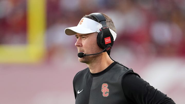 Aug 30, 2025; Los Angeles, California, USA; Southern California Trojans head coach Lincoln Riley watches from the sidelines against the Missouri State Bears in the first half at United Airlines Field at Los Angeles Memorial Coliseum. Mandatory Credit: Kirby Lee-Imagn Images