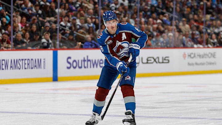 Oct 28, 2025; Denver, Colorado, USA; Colorado Avalanche defenseman Cale Makar (8) passes the puck in the second period against the New Jersey Devils at Ball Arena. Mandatory Credit: Isaiah J. Downing-Imagn Images