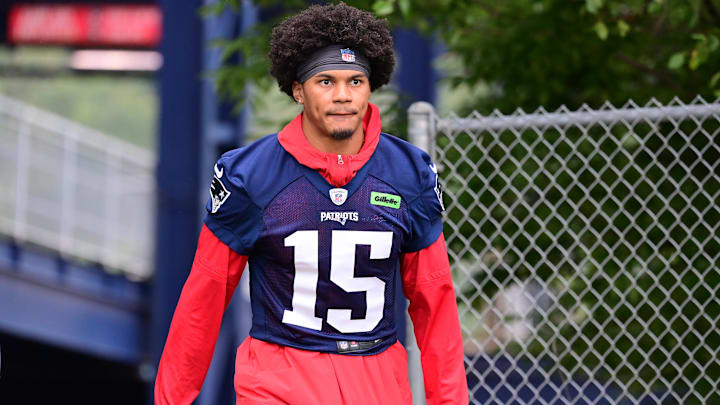 Jul 24, 2024; Foxborough, MA, USA; New England Patriots safety Marte Mapu (15) walks to the practice field during training camp at Gillette Stadium. Mandatory Credit: Eric Canha-Imagn Images