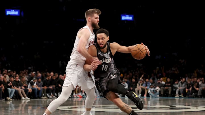 Dec 16, 2024; Brooklyn, New York, USA; Brooklyn Nets guard Ben Simmons (10) drives to the basket against Cleveland Cavaliers forward Dean Wade (32) during the fourth quarter at Barclays Center. Mandatory Credit: Brad Penner-Imagn Images Dec 16, 2024; Brooklyn, New York, USA; Brooklyn Nets guard Ben Simmons (10) drives to the basket against Cleveland Cavaliers forward Dean Wade (32) during the fourth quarter at Barclays Center. Mandatory Credit: Brad Penner-Imagn Images